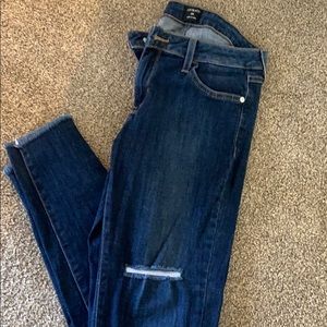 Soft skinny jeans, frayed bottom distressed look.